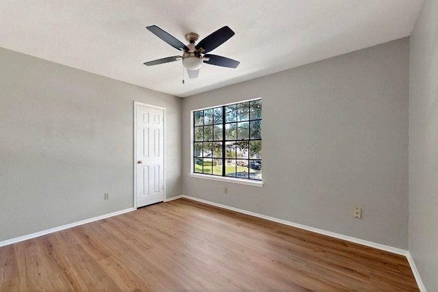 2617 Chowan Cv, Round Rock, TX 78681 - empty room featuring wood finished floors and ceiling fan