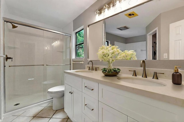 2617 Chowan Cv, Round Rock, TX 78681 - full bathroom featuring double vanity, tile patterned flooring, and a stall shower