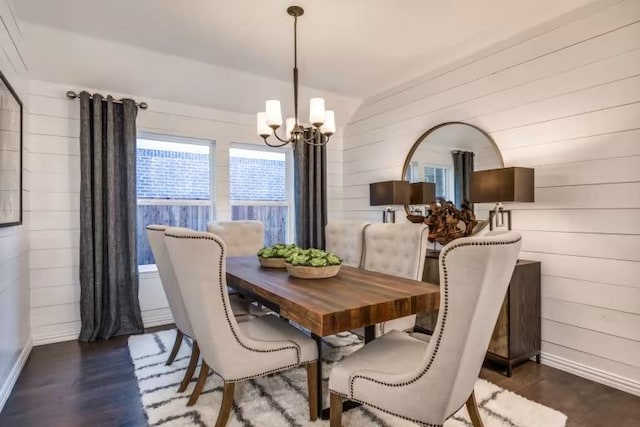 800 Crescent View Dr, Georgetown, TX 78628 - dining room featuring a chandelier, wooden walls, wood finished floors, and lofted ceiling