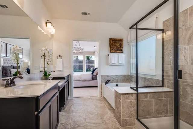 800 Crescent View Dr, Georgetown, TX 78628 - bathroom with ensuite bath, vanity, a bath, and a stall shower