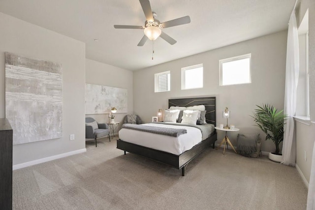 9015 Cattle Baron Path Unit 404, Austin, TX 78747 - bedroom featuring carpet flooring, baseboards, and a ceiling fan