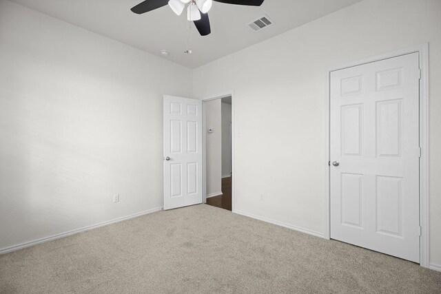 423 Sierra Mar Loop, Leander, TX 78641 - unfurnished bedroom with carpet and ceiling fan