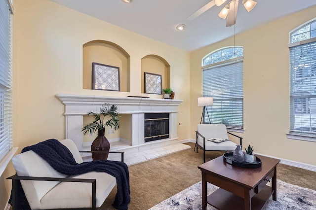 3824 Gaines Ct, Austin, TX 78735 - living room with a ceiling fan, a tiled fireplace, recessed lighting, and carpet