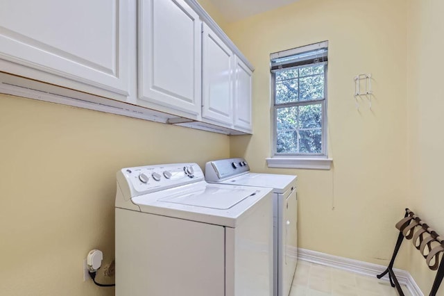 3824 Gaines Ct, Austin, TX 78735 - laundry area with washing machine and clothes dryer and cabinet space