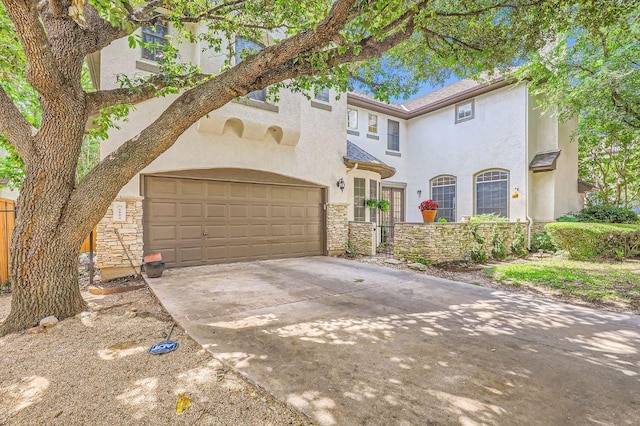 3824 Gaines Ct, Austin, TX 78735 - view of front of property with stucco siding, stone siding, concrete driveway, and an attached garage