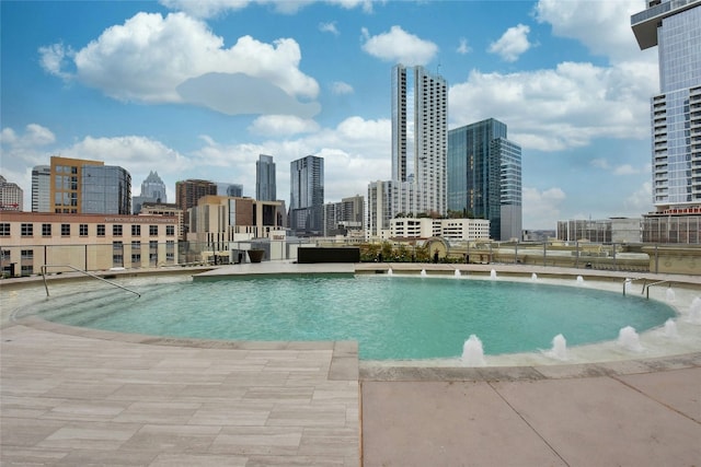501 W Ave Unit 1104, Austin, TX 78701 - community pool featuring a skyline view