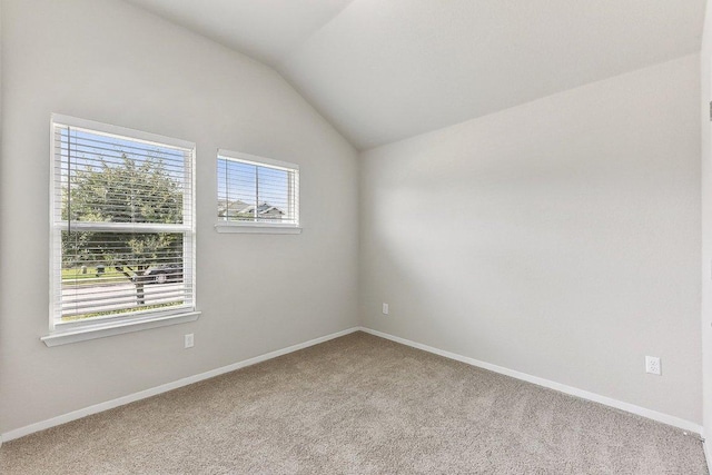 116 Saranac Dr, Elgin, TX 78621 - carpeted spare room featuring vaulted ceiling and baseboards