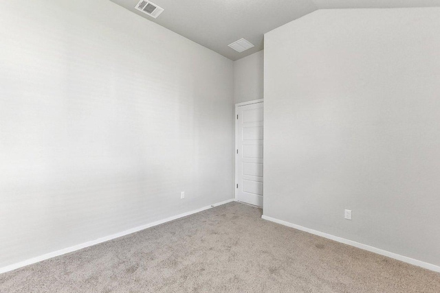 116 Saranac Dr, Elgin, TX 78621 - spare room featuring vaulted ceiling, carpet floors, and baseboards