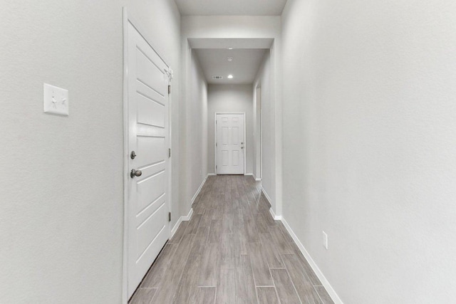 116 Saranac Dr, Elgin, TX 78621 - corridor featuring baseboards and light wood-type flooring