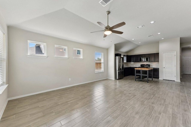 116 Saranac Dr, Elgin, TX 78621 - living room featuring vaulted ceiling, ceiling fan, light wood-type flooring, baseboards, and recessed lighting