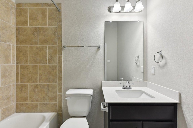 116 Saranac Dr, Elgin, TX 78621 - bathroom with vanity, toilet, bathing tub / shower combination, and a textured wall