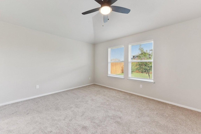116 Saranac Dr, Elgin, TX 78621 - empty room with carpet flooring, lofted ceiling, baseboards, and ceiling fan