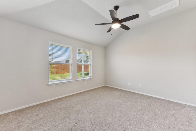 116 Saranac Dr, Elgin, TX 78621 - spare room with carpet floors, a ceiling fan, lofted ceiling, and baseboards