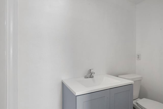 1125 Christie Dr, Austin, TX 78721 - half bathroom with toilet and vanity