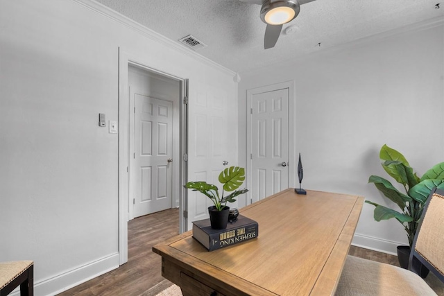 1125 Christie Dr, Austin, TX 78721 - home office featuring a ceiling fan, crown molding, wood finished floors, and a textured ceiling