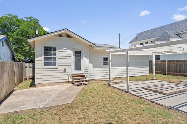 1125 Christie Dr, Austin, TX 78721 - rear view of property featuring entry steps, a patio, and a pergola
