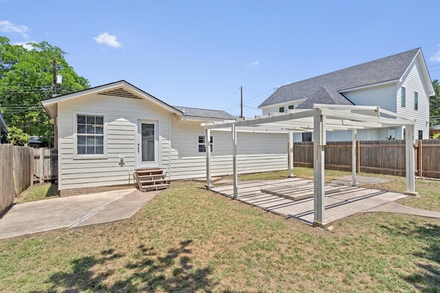 1125 Christie Dr, Austin, TX 78721 - back of house featuring entry steps, a pergola, a patio area, and roof with shingles