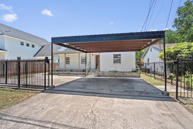 1125 Christie Dr, Austin, TX 78721 - view of front of house with central AC unit and driveway