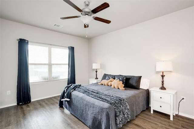 10701 Dimitrios Dr, Austin, TX 78747 - bedroom with wood finished floors and ceiling fan