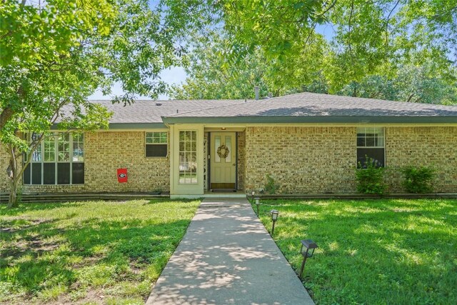 731 Verna Lee Blvd, Harker Heights, TX 76548 - ranch-style house with a front yard and brick siding