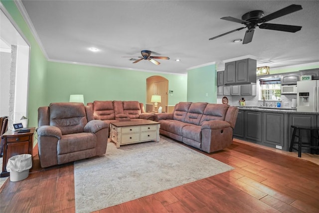 731 Verna Lee Blvd, Harker Heights, TX 76548 - living area with ceiling fan, ornamental molding, arched walkways, wood finished floors, and recessed lighting
