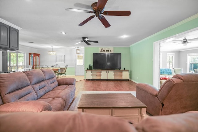 731 Verna Lee Blvd, Harker Heights, TX 76548 - living room with baseboards, a ceiling fan, ornamental molding, wood finished floors, and recessed lighting