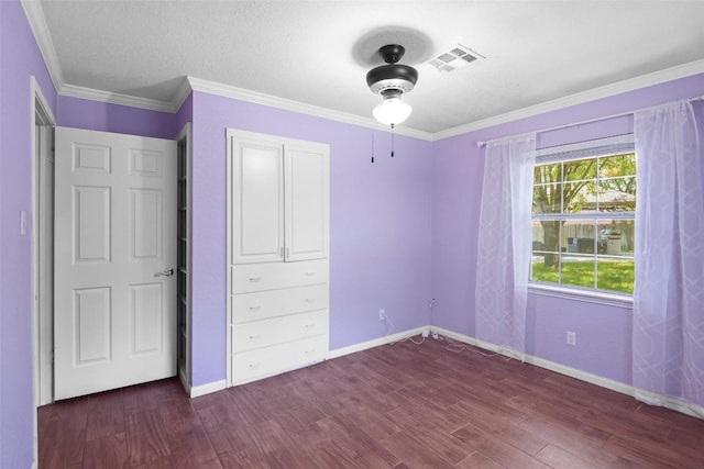 731 Verna Lee Blvd, Harker Heights, TX 76548 - unfurnished bedroom with wood finished floors, baseboards, and crown molding