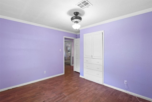 731 Verna Lee Blvd, Harker Heights, TX 76548 - unfurnished bedroom featuring wood finished floors, baseboards, and crown molding
