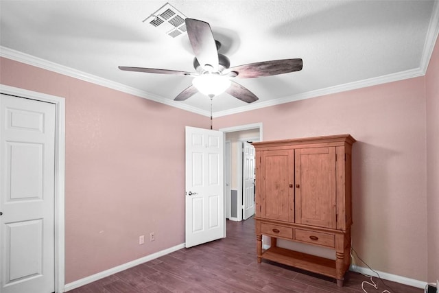 731 Verna Lee Blvd, Harker Heights, TX 76548 - unfurnished bedroom featuring dark wood-type flooring, ornamental molding, baseboards, and a ceiling fan