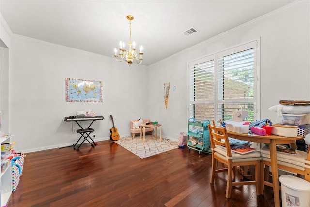 5357 Austral Loop, Austin, TX 78739 - dining room featuring a chandelier, wood finished floors, and ornamental molding