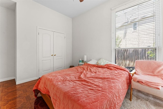 5357 Austral Loop, Austin, TX 78739 - bedroom with a closet and a ceiling fan