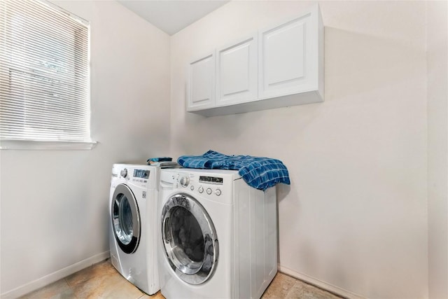 5357 Austral Loop, Austin, TX 78739 - laundry room featuring cabinet space, washer and clothes dryer, and baseboards