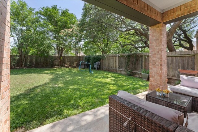 5357 Austral Loop, Austin, TX 78739 - fenced backyard featuring an outdoor living space and a patio