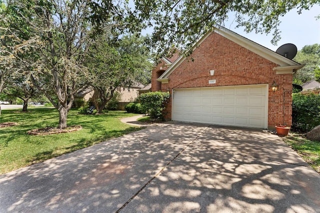 5357 Austral Loop, Austin, TX 78739 - view of side of home featuring brick siding, driveway, a yard, and an attached garage