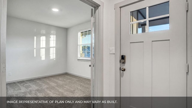 549 Osprey Dr, Leander, TX 78641 - carpeted foyer entrance featuring baseboards
