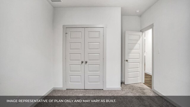 549 Osprey Dr, Leander, TX 78641 - unfurnished bedroom with carpet flooring, baseboards, and a closet