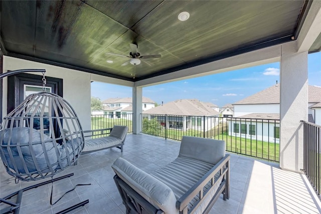 5028 Olimpico Way, Leander, TX 78641 - view of patio featuring ceiling fan and a residential view