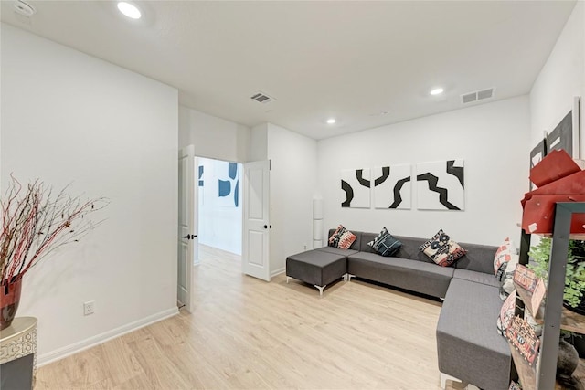 5028 Olimpico Way, Leander, TX 78641 - living room featuring wood finished floors and recessed lighting