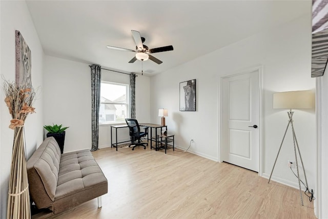 5028 Olimpico Way, Leander, TX 78641 - sitting room with light wood-style floors, a ceiling fan, and baseboards