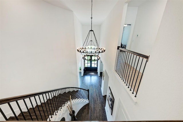 5028 Olimpico Way, Leander, TX 78641 - staircase with a chandelier and wood finished floors