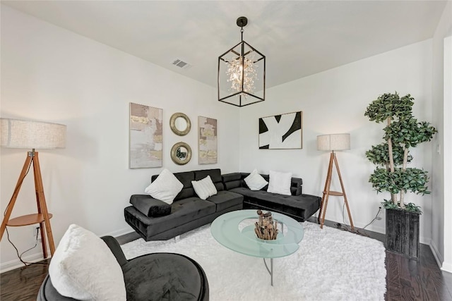 5028 Olimpico Way, Leander, TX 78641 - living area featuring a chandelier and dark wood-type flooring