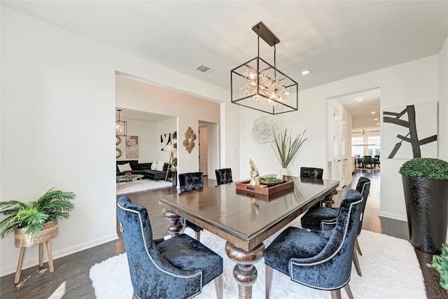 5028 Olimpico Way, Leander, TX 78641 - dining space featuring a chandelier, wood finished floors, and recessed lighting