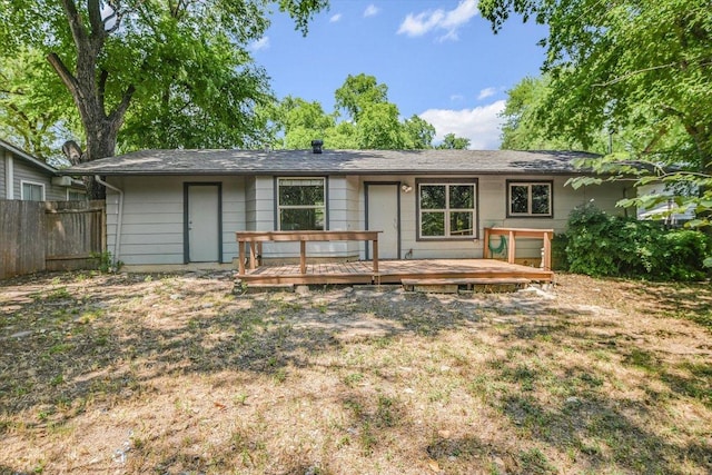 8711 Bridgeport Dr, Austin, TX 78758 - back of property featuring a wooden deck