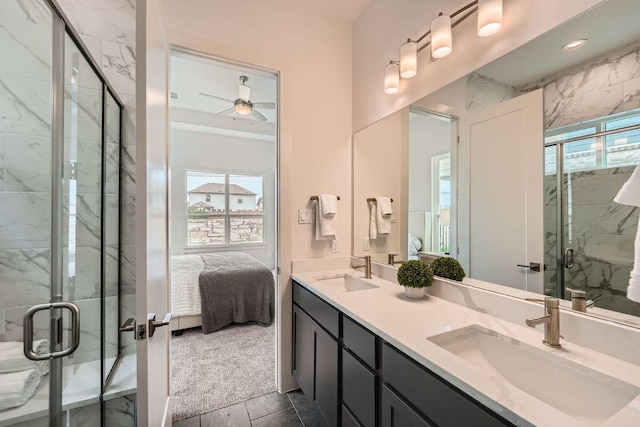 1531 N Red Bud Ln Unit 34, Round Rock, TX 78665 - ensuite bathroom featuring plenty of natural light, double vanity, a ceiling fan, and a marble finish shower