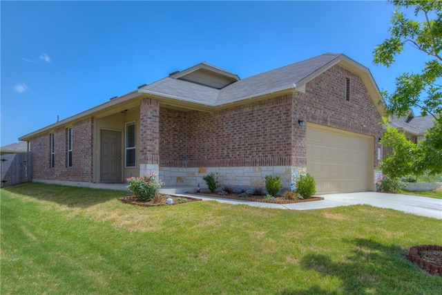 564 Moonwalker Trl, Buda, TX 78610 - view of front of property featuring brick siding, driveway, and an attached garage