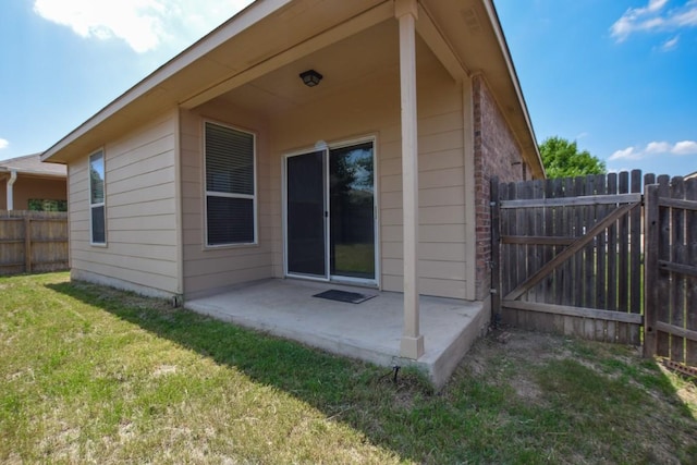 564 Moonwalker Trl, Buda, TX 78610 - back of house featuring a patio