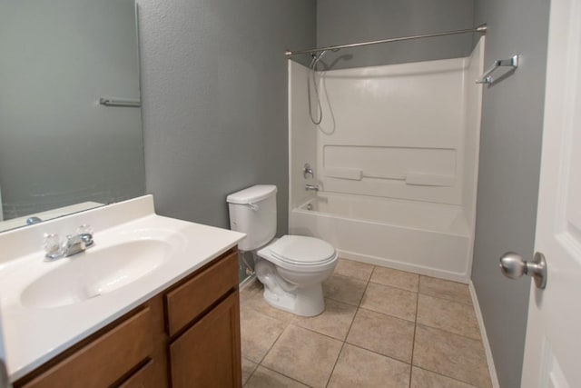 564 Moonwalker Trl, Buda, TX 78610 - full bathroom featuring vanity, bathtub / shower combination, tile patterned floors, toilet, and baseboards