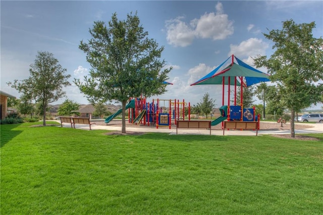 564 Moonwalker Trl, Buda, TX 78610 - community jungle gym featuring a yard