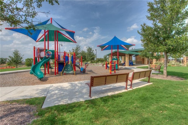 564 Moonwalker Trl, Buda, TX 78610 - community playground with a yard