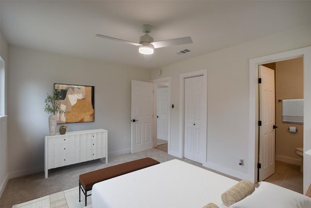 5507 Gloucester Ln, Austin, TX 78723 - bedroom with ceiling fan, connected bathroom, light colored carpet, and a closet